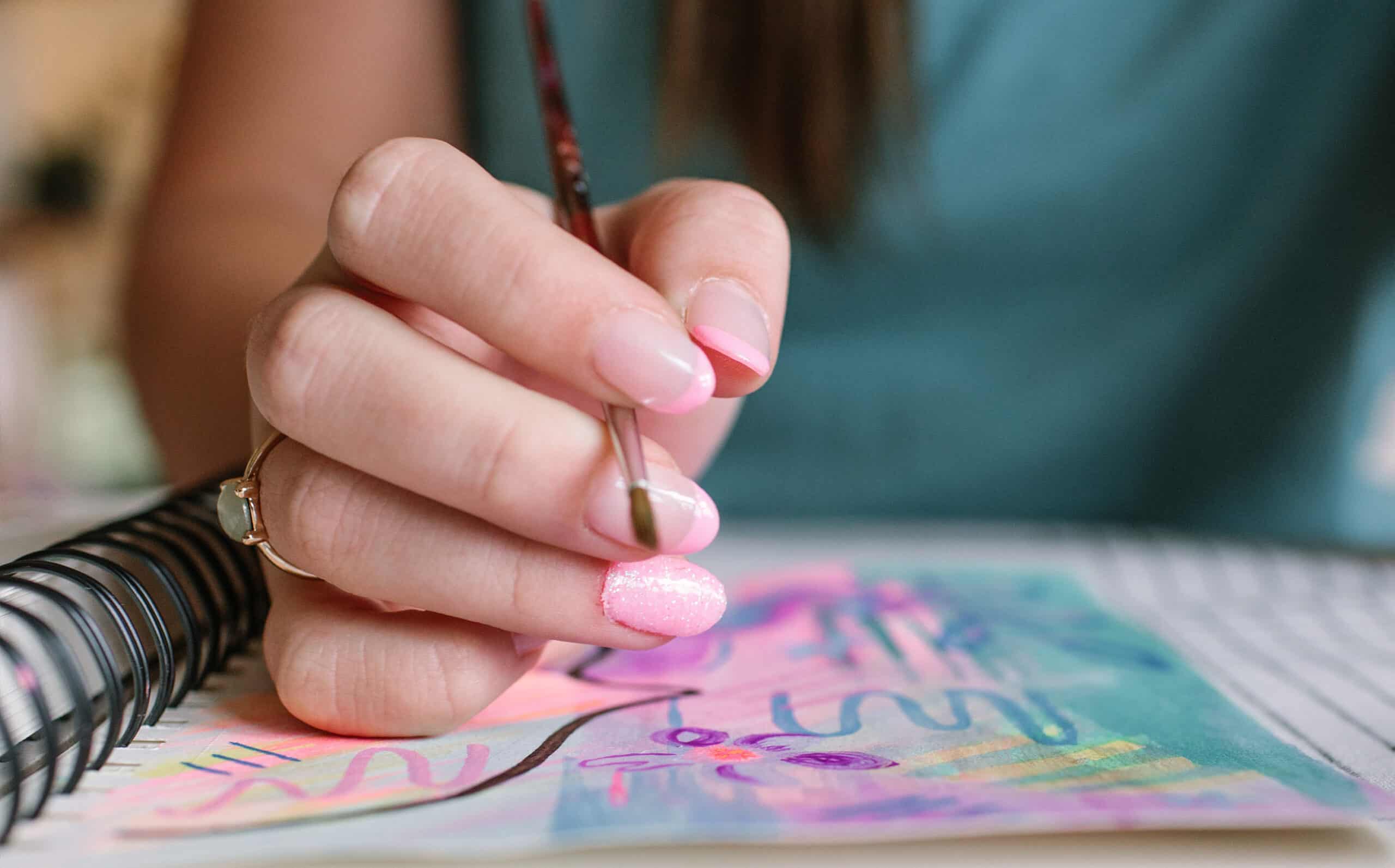 Journaling to ease anxiety - a teen girl is journaling - a close-up on her page